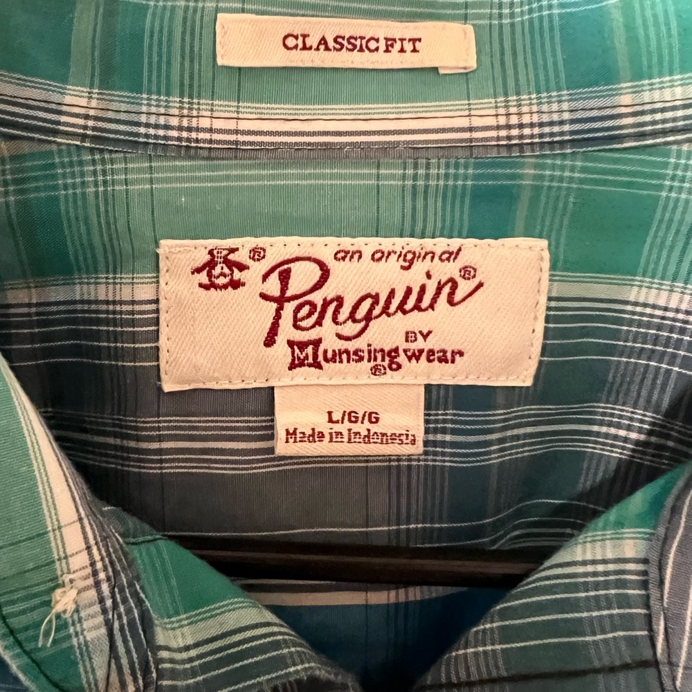 This is a nice button down penguin shirt, great quality, size large